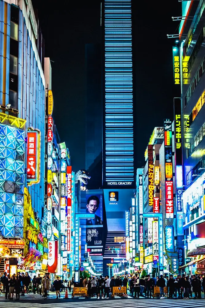 Shinjuku-style Tokyo alley glowing with neon signs